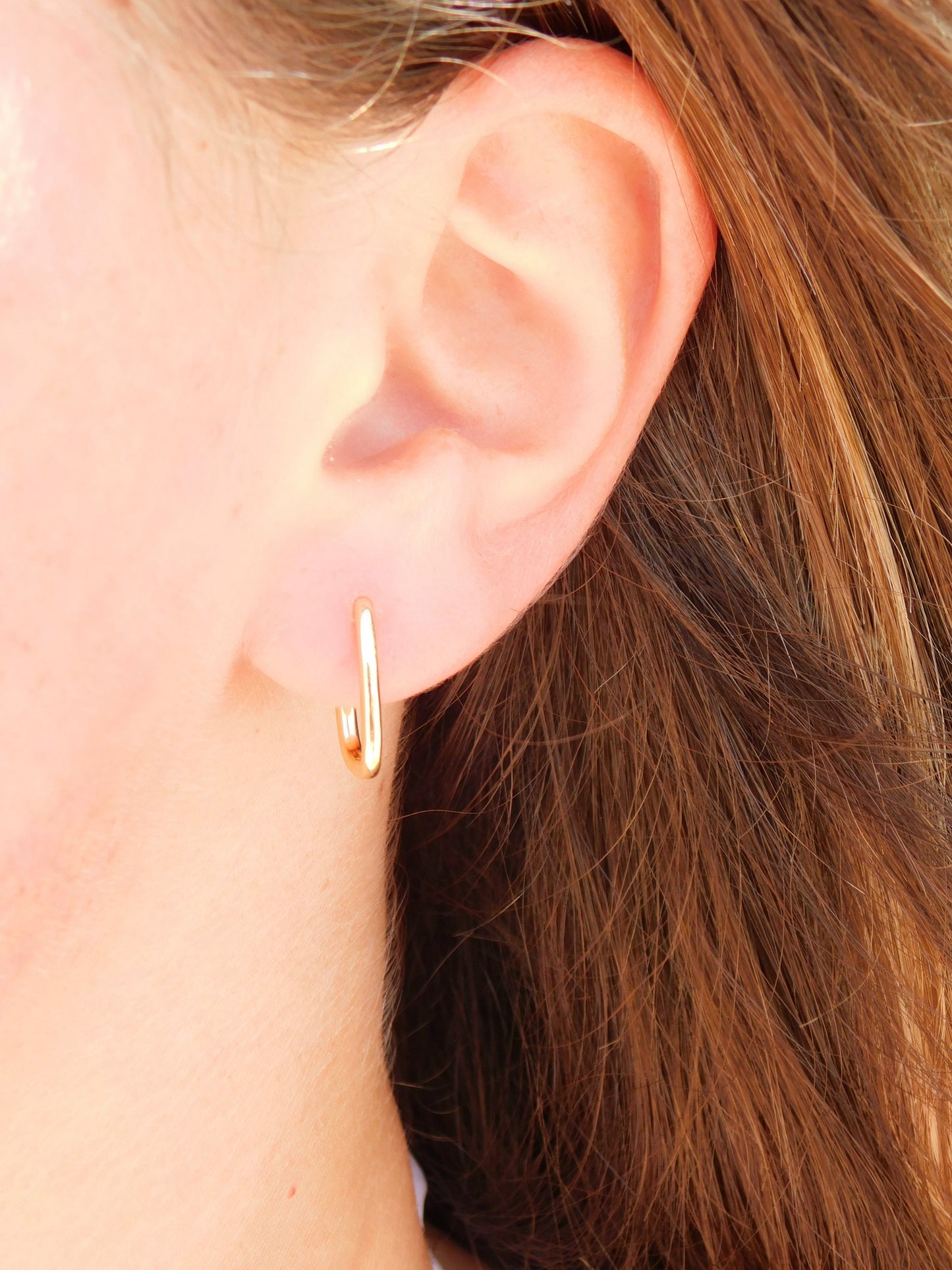 Golden Oval Huggie Hoops